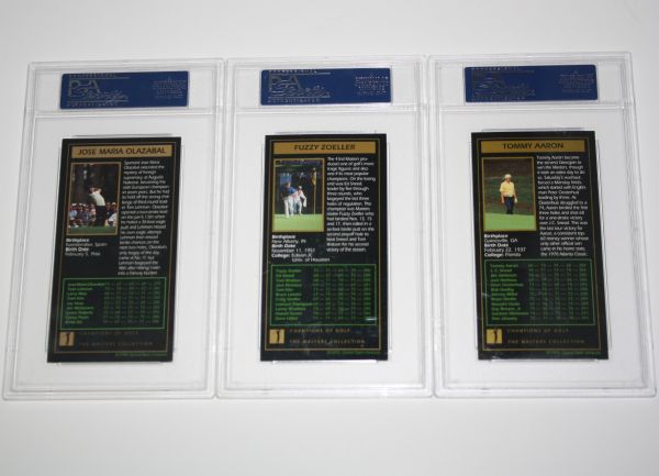 Three Signed G.S.V. Cards: Jose Maria Olazabal, Fuzzy Zoeller, and Tommy Aaron (PSA Slabbed)