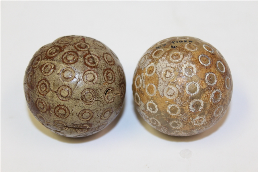 Two Classic US Tiger 'Donut' Pattern Golf Balls