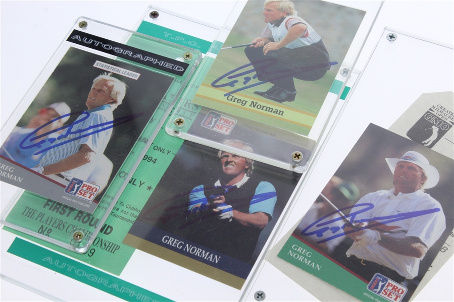 Four Greg Norman Signed Golf Cards JSA ALOA