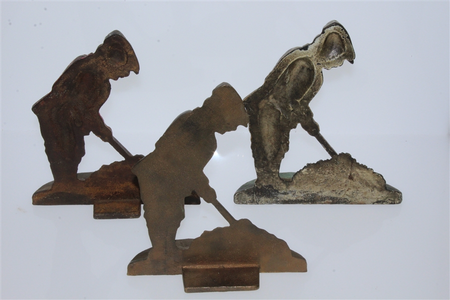 Three Vintage Cast Iron Golfer Themed Doorstops - Red, Yellow, and Brass - Roth Collection