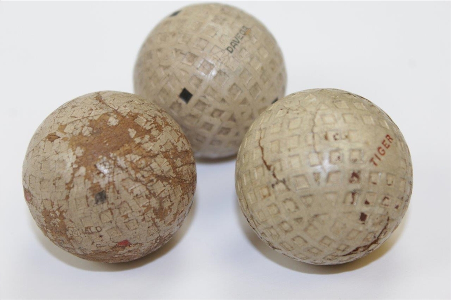 Three (3) Vintage Square Mesh Golf Balls - Davega, Tiger, & Wilson