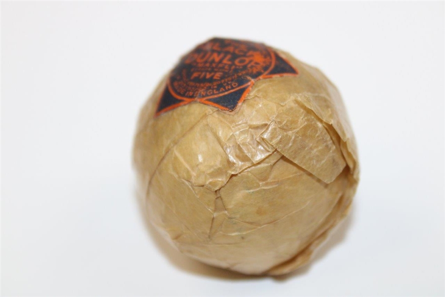 c. 1920's The Black Dunlop Maxfli Mesh Golf Ball In Original Wrapping
