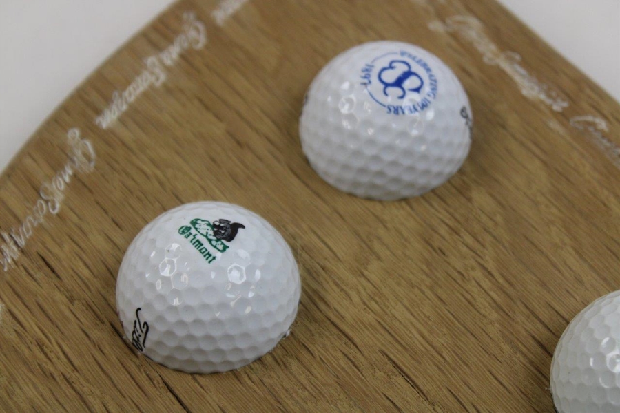 Gene Sarazen Mounted Display of Seven (7) Logo Golf Balls from Sites of Major Wins 