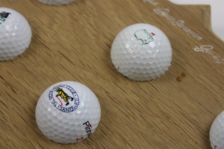 Gene Sarazen Mounted Display of Seven (7) Logo Golf Balls from Sites of Major Wins 