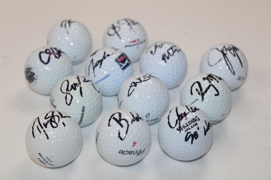 Twelve (12) Golf Stars Signed Various Logo Golf Balls JSA ALOA