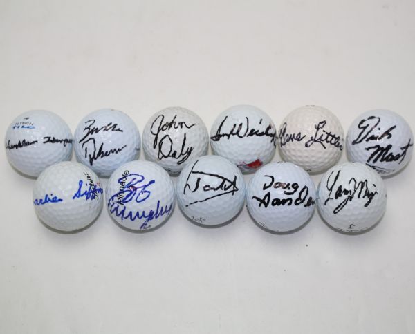 Lot of Eleven Signed Golf Balls- Incl. John Daly, Tom Weiskopf, Charles Sifford JSA COA