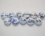 Lot of Eleven Signed Golf Balls- Incl. John Daly, Tom Weiskopf, Charles Sifford JSA COA