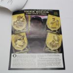 Tiger Woods Upper Deck Gold Foil 'Tiger Slam' Cards in Book