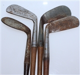 Four Classic Hickory Golf Clubs