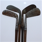 Four Classic Hickory Golf Clubs