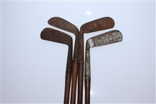 Four Classic Hickory Golf Clubs