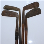 Four Classic Hickory Golf Clubs