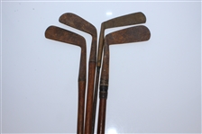 Four Classic Hickory Golf Clubs