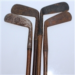 Four Classic Hickory Golf Clubs