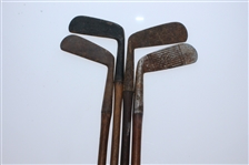 Four Classic Hickory Golf Clubs