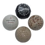 Four Classic Golf Balls - Porky Oliver, Top-Flite, Unamarked Mesh, & Dunlop 65 in Cover