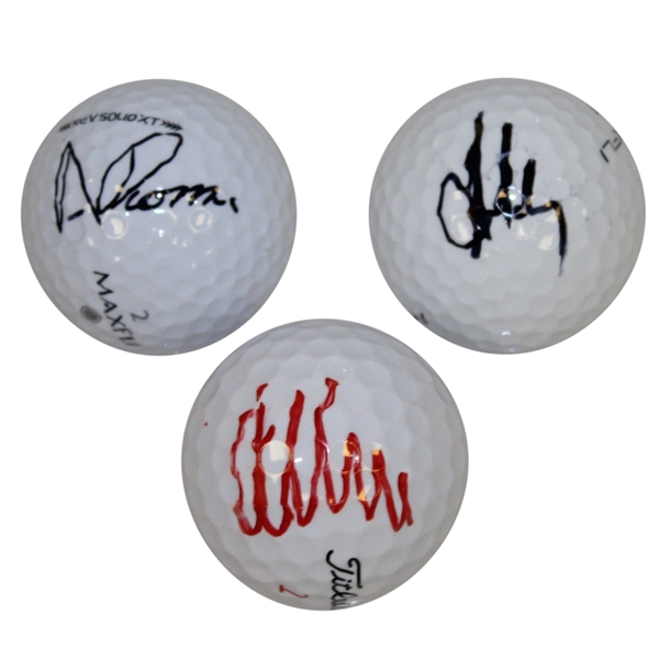 Anthony Kim, Andres Romero, & Aaron Baddeley Signed Golf Balls PSA/DNA & Leaf
