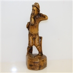 Unmarked Wooden Golfer Sitting on Bench Statue