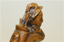 Unmarked Wooden Golfer Sitting on Bench Statue