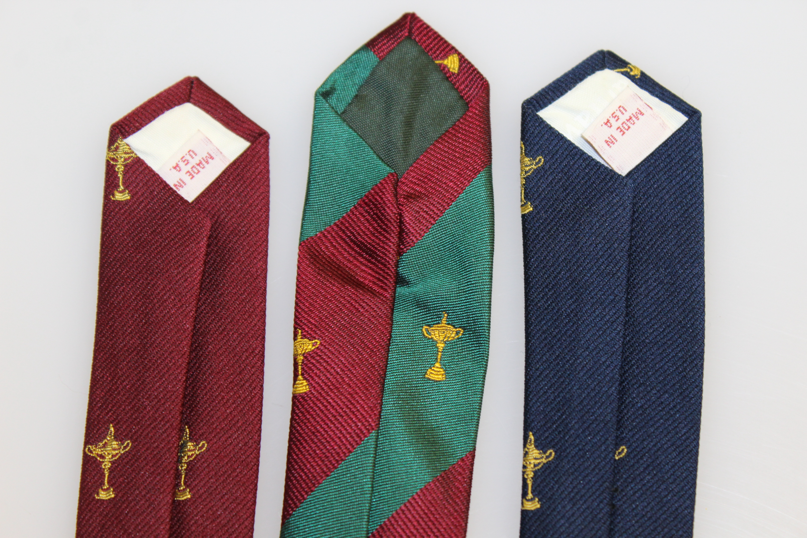 Lot Detail - Ryder Cup Ties - Blue Trophy, Red Trophy, & Red/Green Trophy