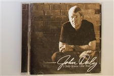 Signed John Daly Polo, Golf Glove, And CD  - JSA AOLA