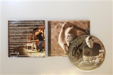 Signed John Daly Polo, Golf Glove, And CD  - JSA AOLA