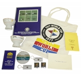 1977 World Cup Bag w/ Program, Scorecard, Pins, Cups & Other Pieces 
