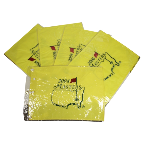One 2004 & Four 2006 Masters Embroidered Flags in Original Plastic