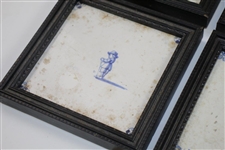 Four Delft Golf Decorated Porcelain Tiles with Black Frames