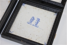 Four Delft Golf Decorated Porcelain Tiles with Black Frames