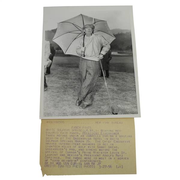 President Eisenhower with Umbrella Wearing "Fancy Pants" 7 1/8x9 Wire Photo 3/27/56