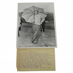 President Eisenhower with Umbrella Wearing "Fancy Pants" 7 1/8x9 Wire Photo 3/27/56