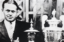 Bobby Jones B&W 16x20 Matted Photo with Grand Slam Trophies