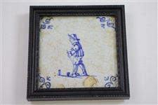 Two Delft Golf Decorated Porcelain Tiles with Black Frames