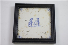 Two Delft Golf Decorated Porcelain Tiles with Black Frames