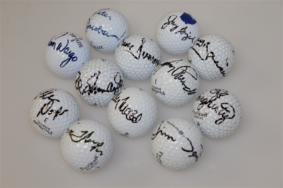 Twelve Signed Golf Balls - Dent, Jacobsen, Dougherty, and others JSA ALOA