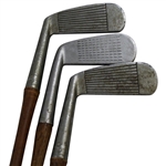 1925 Wellington-Stone Co. Original Cast Iron Parlor Putter with Three Original Clubs