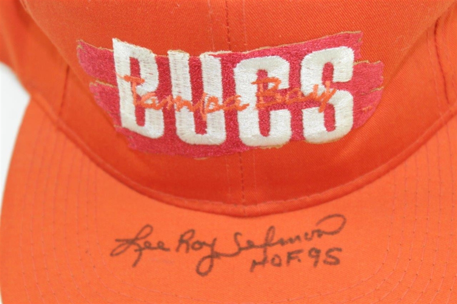 HOF Lee Roy Selmon Signed Golf Ball, Classic Bucs Hat, & Two Football Cards (RC) JSA ALOA