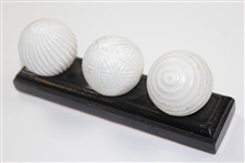 Facsimile Golf Balls On Wooden Stand