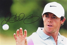 Rory McIlroy Signed Photo at The 2014 Open at Royal Liverpool Eyeing The Ball JSA ALOA