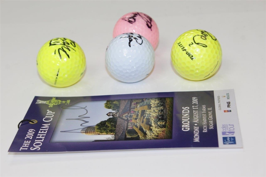 Four (4) LPGA Stars Signed Golf Balls with Signed 2009 Solheim Cup Ticket JSA ALOA