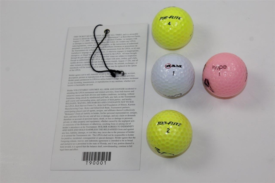 Four (4) LPGA Stars Signed Golf Balls with Signed 2009 Solheim Cup Ticket JSA ALOA