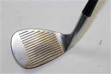 Greg Norman's Personal Used Cobra Sand Wedge with Lead Tape on Back