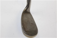 Greg Norman's Personal Used P-U-N-C-H Wedge