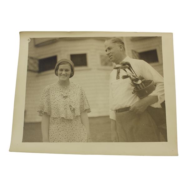 Maureen Orcutts Original in Augusta (Montell)Photo - With Gentleman Holding Golf Bag with Clubs
