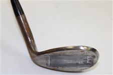 Greg Norman's Personal Used Unmarked Pitching Wedge with Lead Tape