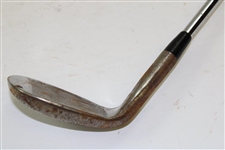 Greg Norman's Personal Used Unmarked Pitching Wedge with Lead Tape