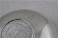 1955 Spring Sterling Dish with Resting Golf Club Across Silver Dollar