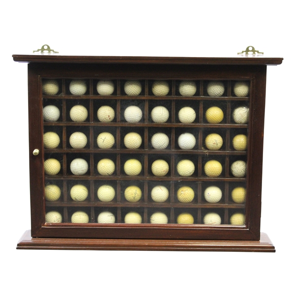 Forty-Eight (48) Dimple & Mesh Pattern Golf Balls in Wood Display Case