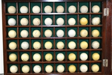 Forty-Eight (48) Dimple & Mesh Pattern Golf Balls in Wood Display Case